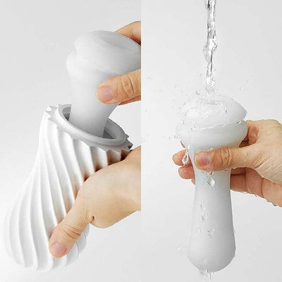 Hands demonstrating the flexible spiral design and rinsing of the Tenga Flex Bubbly Blue Stroker.