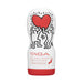 Tenga Original Vacuum Cup with Keith Haring artwork featuring two figures holding a red heart on white and red packaging.