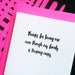 White letter-pressed card with bold black text and bright pink envelope, expressing gratitude with a playful family message.