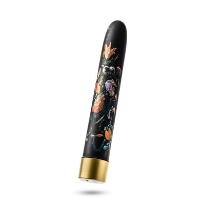 Slim black 7-inch vibrator with floral design and gold base, rechargeable and waterproof.