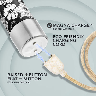 Close-up of black floral vibrator with eco-friendly Magna Charge USB rechargeable cord and raised plus, flat minus control buttons.