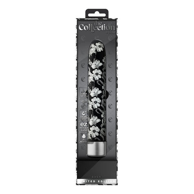 Black 7-inch rechargeable vibrator with white floral design in sleek packaging labeled The Collection Eden Limited Edition.