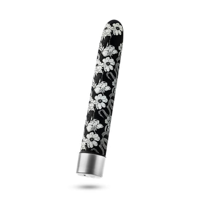 Black 7-inch slim vibrator with white floral pattern and silver base, rechargeable and waterproof design.