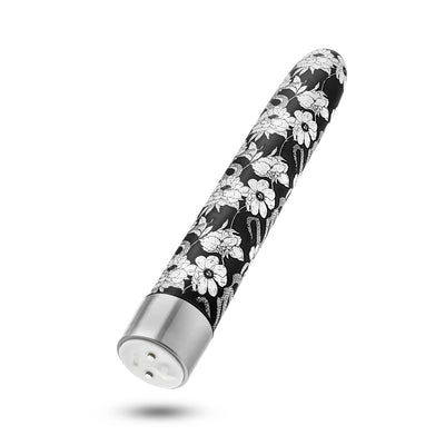 Black 7-inch slim vibrator with white floral pattern and silver base, featuring a raised plus control button.
