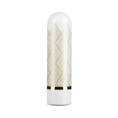 Compact white bullet vibrator with gold geometric diamond pattern and gold accent band at the base.