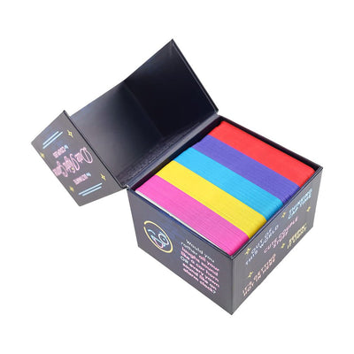 Open box of colorful date night game cards for couples with sections in pink, yellow, blue, purple, and red.