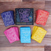 The Ultimate Date Night Game for Couples with five colorful card stacks labeled by category on a wooden surface.