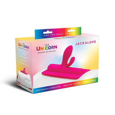 Packaging of The Unicorn Jackalope Silicone Attachment in bright pink with rainbow accents and product features highlighted.