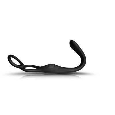 The-vibe black and silver flexible male strap and anal stimulator with dual rings and curved design.