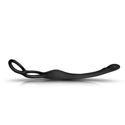 The-vibe Black/silver flexible male strap and anal stimulator with dual rings and textured curved shaft.