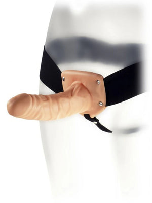 Realistic 6.5-inch veined dildo attached to adjustable black elastic strap-on harness on mannequin.