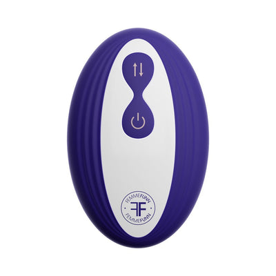 Purple and white wireless remote control with power and thrust buttons for the Thruster Baller device.