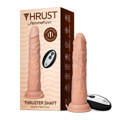 Realistic flesh-toned thrusting dildo with textured shaft and wireless remote control next to product packaging.