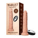 Realistic flesh-toned thrusting dildo with textured shaft and wireless remote control next to product packaging.