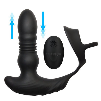 Black silicone thrusting vibrator with cock and ball ring and wireless remote control shown with motion arrows.