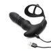 Black silicone thrusting vibrator with attached cock and ball ring, shown with USB charging cable on white background.