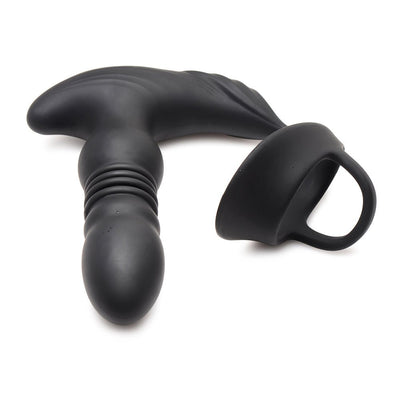 Black silicone thrusting vibrator with attached cock and ball ring, designed for male pleasure and ergonomic stimulation.