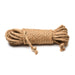 Coiled natural jute rope in undyed beige, 25 feet long, ideal for rope bondage and shibari practice.