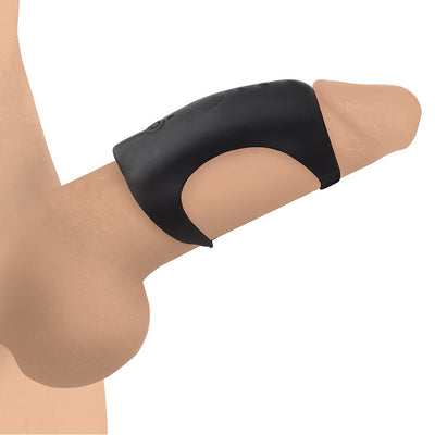 Black silicone vibrating shaft ring with remote control displayed on a flesh-toned model.