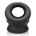 Black silicone tri-ring cocksling and ball stretcher with smooth, flexible design and contoured shape.