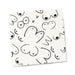 White beverage napkin with a playful black line art pattern of abstract shapes and dots.