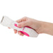 Hand holding a white and pink Ultimate Personal Shaver designed for women with a close-up on the shaving head and power button.