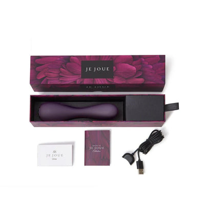 Je Joue Uma G-spot vibrator in purple with packaging, USB charging cable, and user manuals displayed on white background.