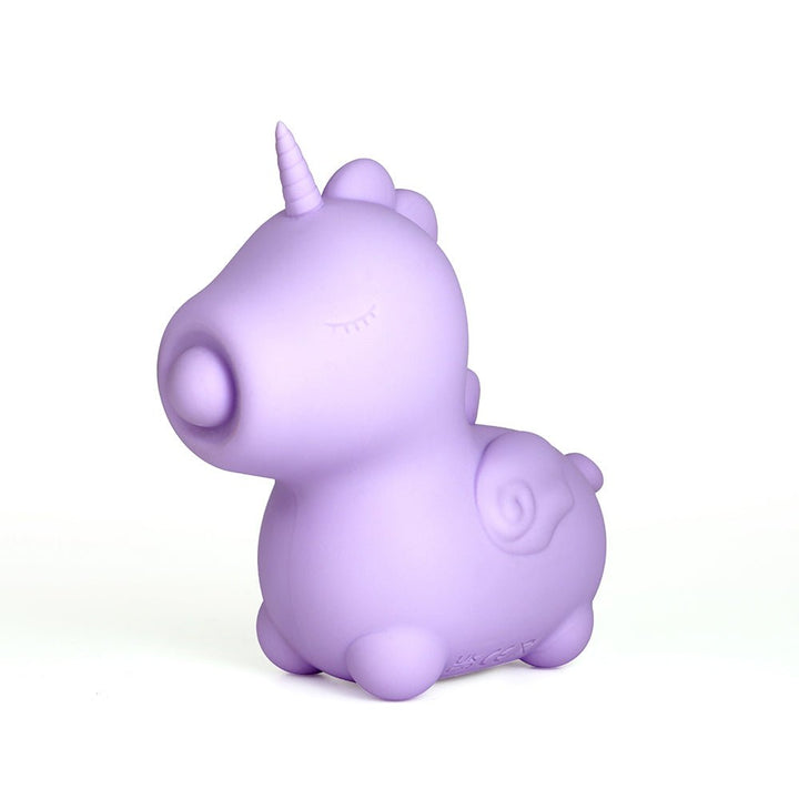 Lilac silicone mini unicorn-shaped vibrator with a smooth matte finish and closed eyes design.