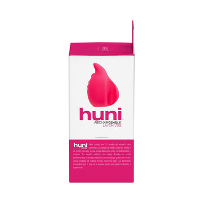 Packaging box of Vedo Huni rechargeable finger vibrator in pink and white with product image and description.