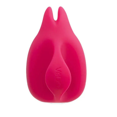 Compact pink silicone finger vibrator with split tip and ergonomic design for precise control and clitoral stimulation.