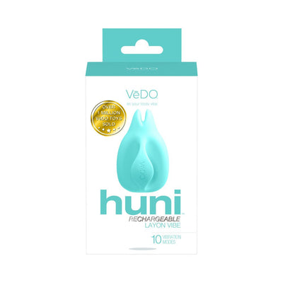 Packaging of Vedo Huni rechargeable finger vibe in turquoise with 10 vibration modes and ergonomic design.