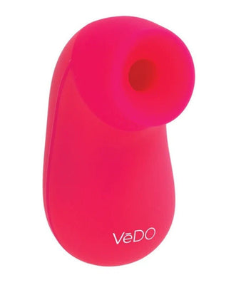 Compact bright pink VeDO Nami rechargeable sonic vibe with a smooth silicone surface and a circular opening.
