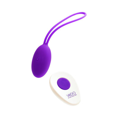 Purple VeDO Peach rechargeable egg vibrator with remote control on white background.