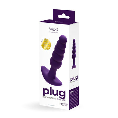 Packaging of Vedo Plug rechargeable purple silicone vibrating anal plug with 10 vibration modes shown.