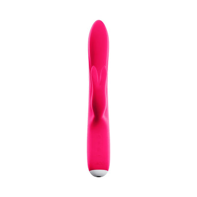 Bright pink rechargeable dual-motor vibrator with flexible shaft and bunny-shaped clitoral stimulator.