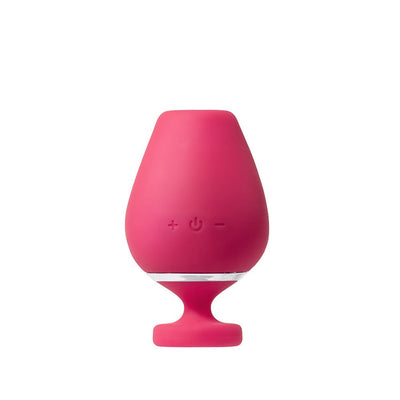 Pink rechargeable vibrating sonic vibe shaped like a wine glass with control buttons on the front.
