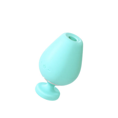 Mint green rechargeable vibrating sonic vibe shaped like a wine glass with control buttons on the side.