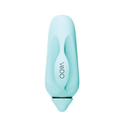 Compact rechargeable finger vibrator in soft blue silicone with ergonomic grip and sleek design by VeDO.