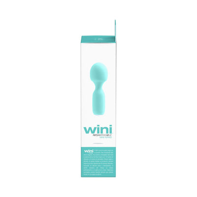 Packaging box of Vedo Wini rechargeable mini wand in light blue and white with product image and description.