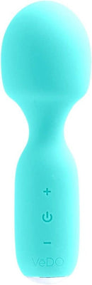 Compact turquoise rechargeable mini wand with smooth silicone finish and simple control buttons on handle