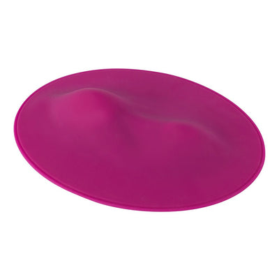 Magenta oval-shaped VibePad with smooth silicone surface and ergonomic contours for targeted external stimulation.