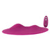 Ergonomic magenta silicone VibePad with dual motors and matching remote control for customizable external stimulation.