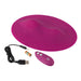 Purple ergonomic silicone Vibepad with remote control, USB charging cable, and battery on white background.