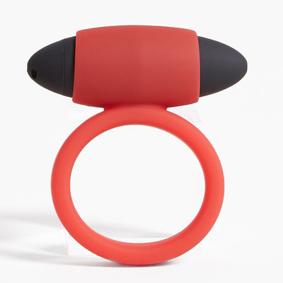 Red silicone vibrating ring with removable black bullet vibrator on white background.