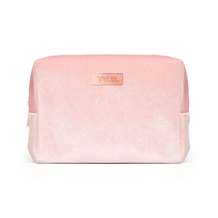 Soft pink velvet VUSH Making Moves storage case with rose gold logo plaque, rectangular and compact design.