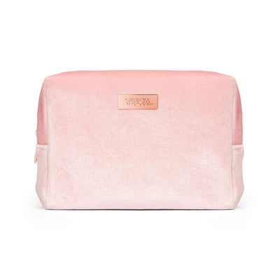 Soft pink velvet VUSH Making Moves storage case with rose gold logo plaque, rectangular and compact design.