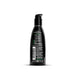 Back view of Wicked Aqua Candy Apple 2oz lubricant bottle with product details and usage instructions.