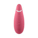 Pink Womanizer Premium 2 clitoral stimulator with ergonomic design and multiple control buttons on a white background.