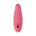 Pink Womanizer Premium 2 clitoral stimulator with sleek design and silicone body, featuring Pleasure Air Technology opening.