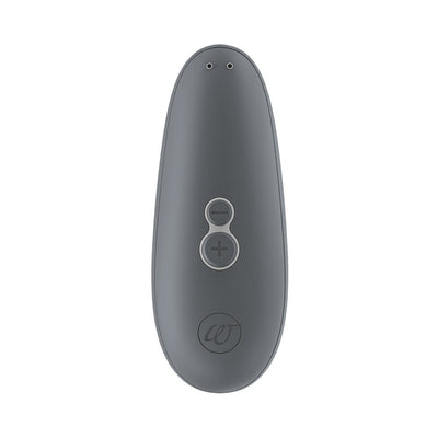 Gray Womanizer Starlet 3 clitoral stimulator with plus and minus buttons on a white background.